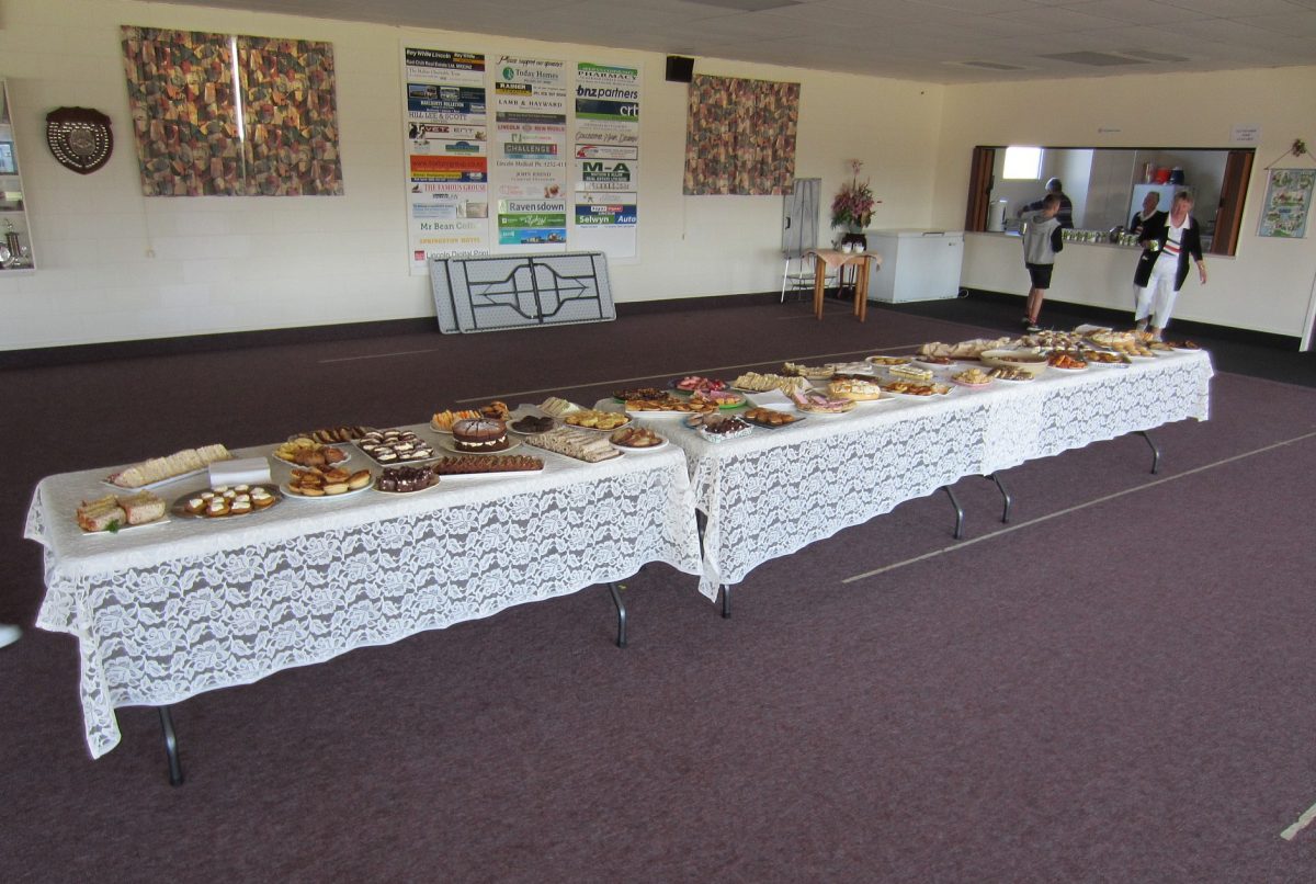 A large buffet laid out on the oblong tables